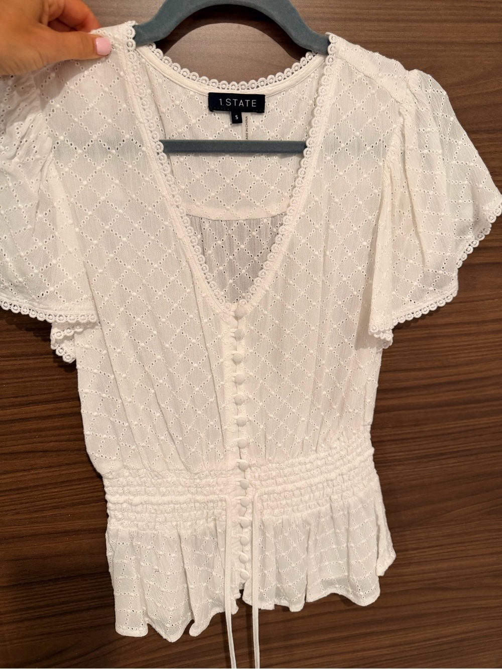 1. STATE White Eyelet Button-Front Peplum Top